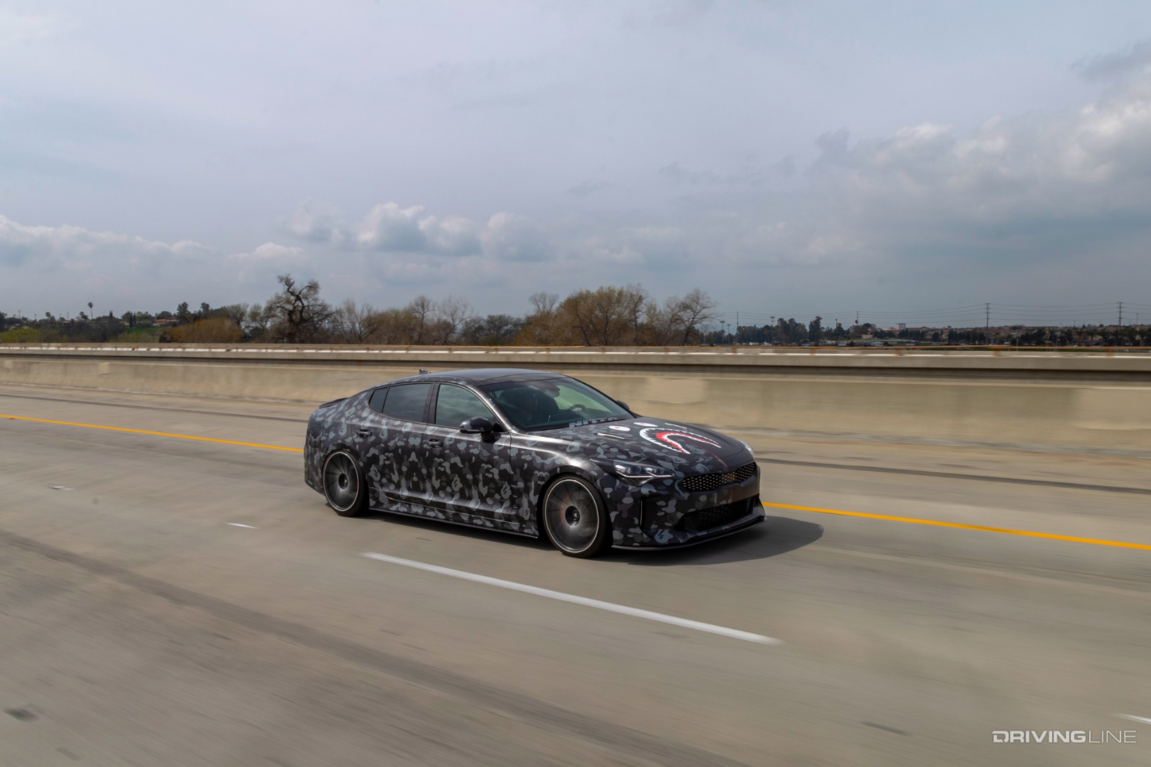 2018 Kia Stinger on the freeway driving fast