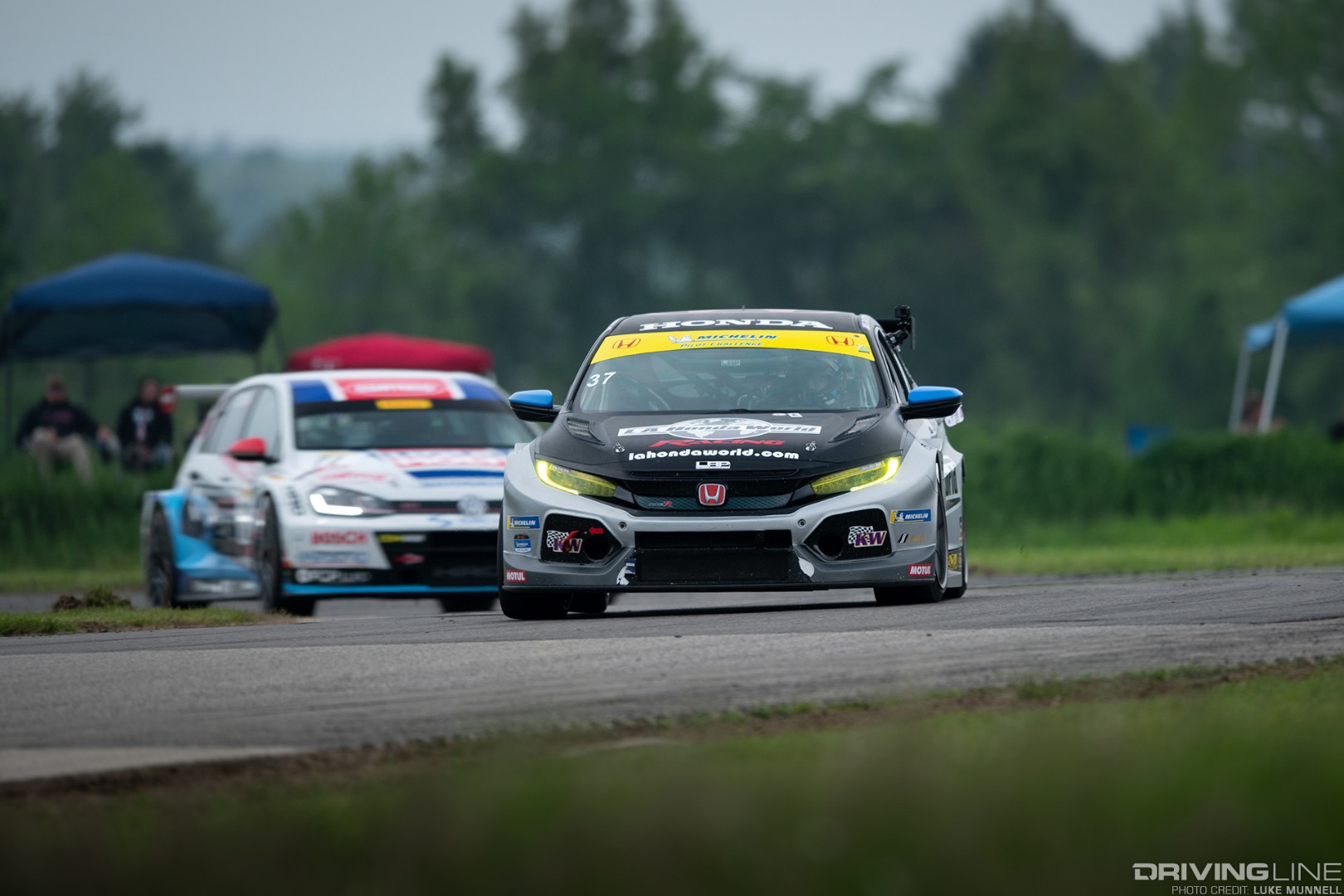 Gridlife Midwest Festival World Challenge Honda Civic and VW Golf TCR race cars battling in the rain