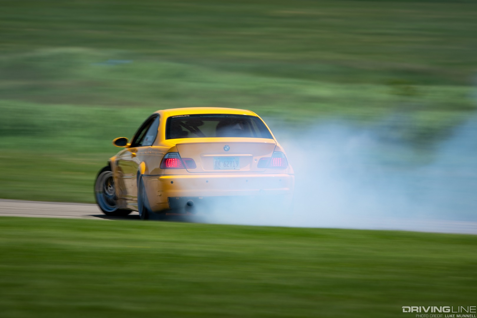 Gridlife Midwest Festival - yellow BMW E46 M3 drift car rear slide