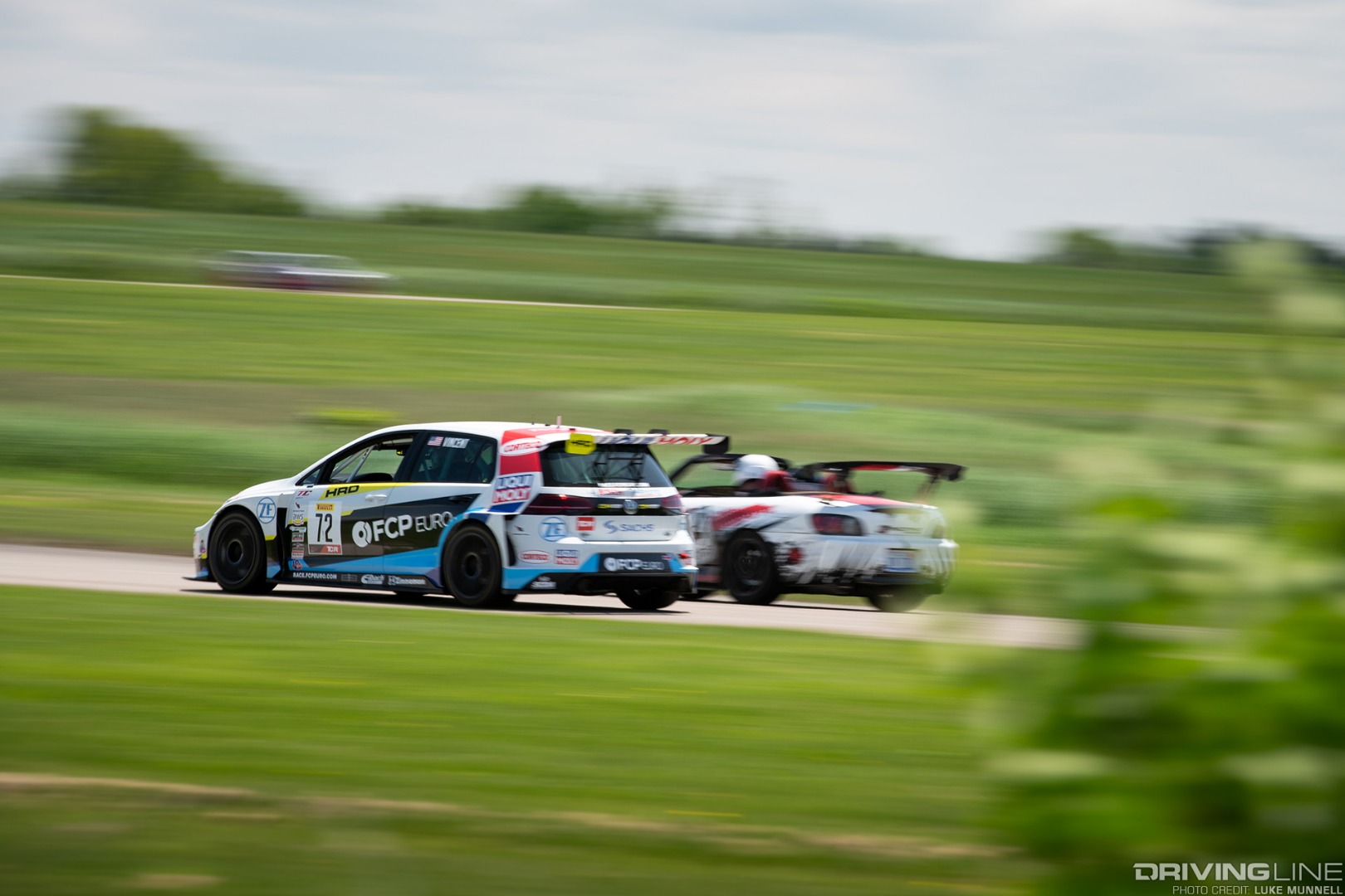Gridlife Midwest Festival FCP Euro VW Golf TCR car battling on track