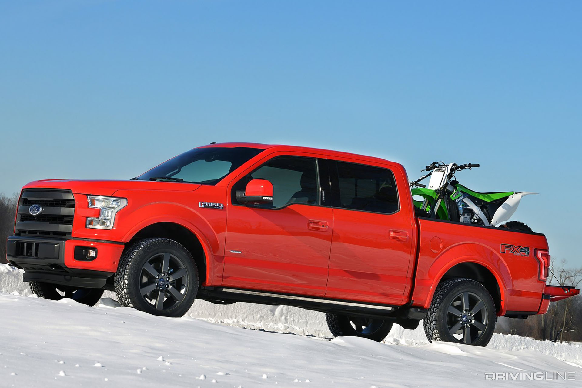 2015 Ford F-150 with a dirtbike in the bed