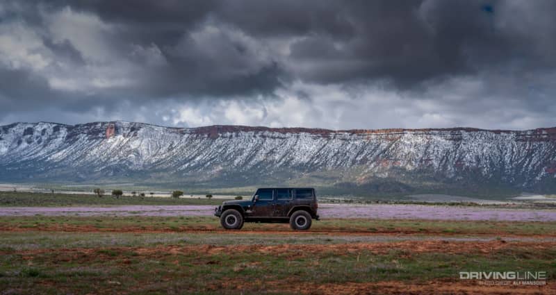 Jeep Wrangler JK in front of a mountain range