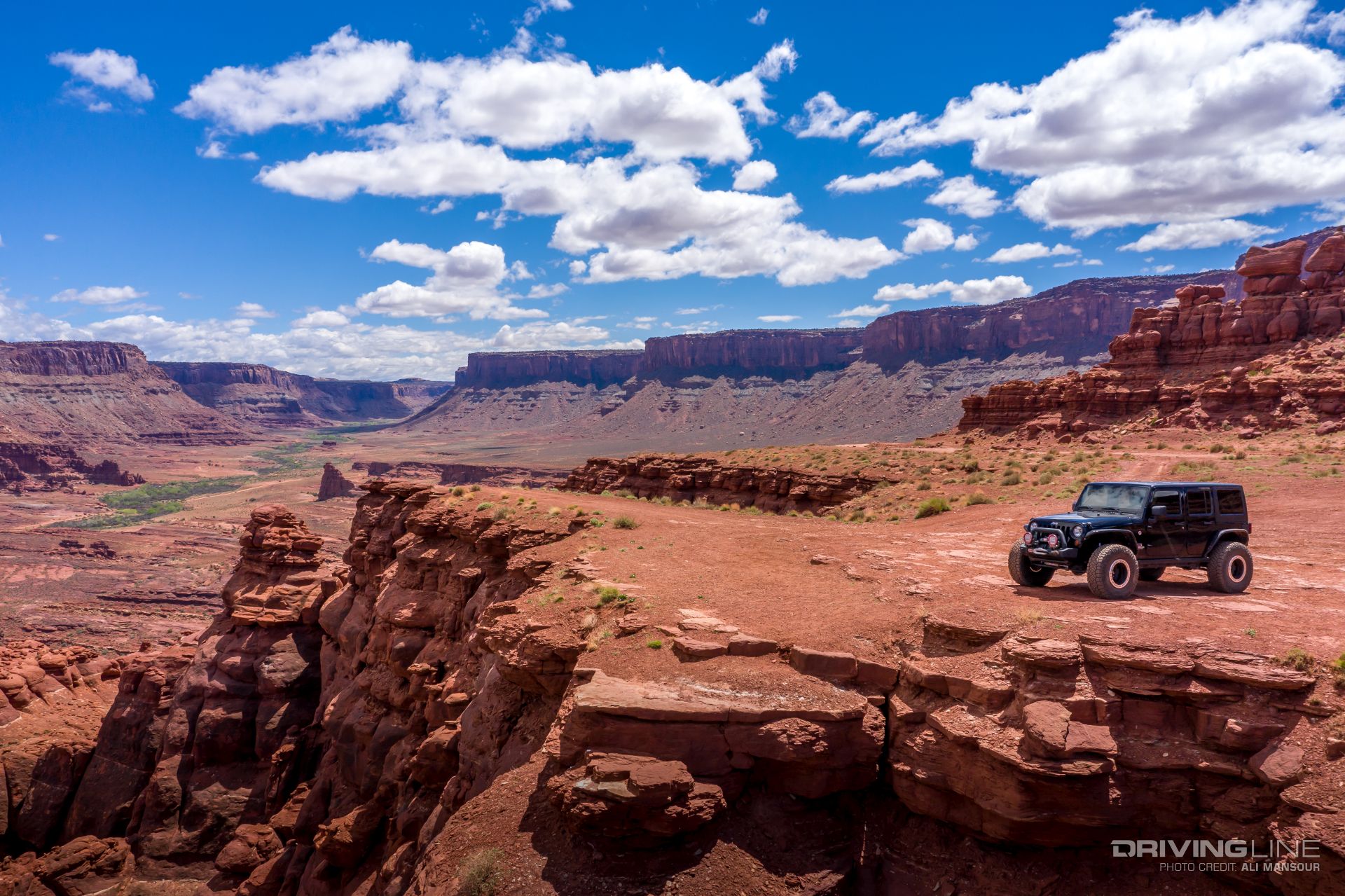 Jeep Wrangler JK next to a canyon