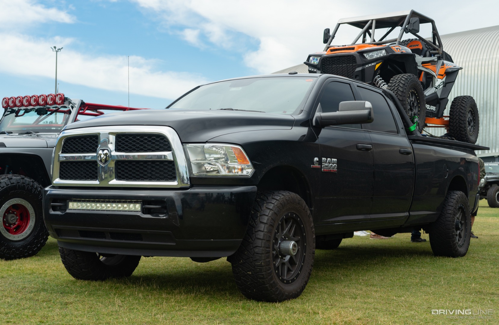 Cummins Ram with a UTV in the bed at Rigstock