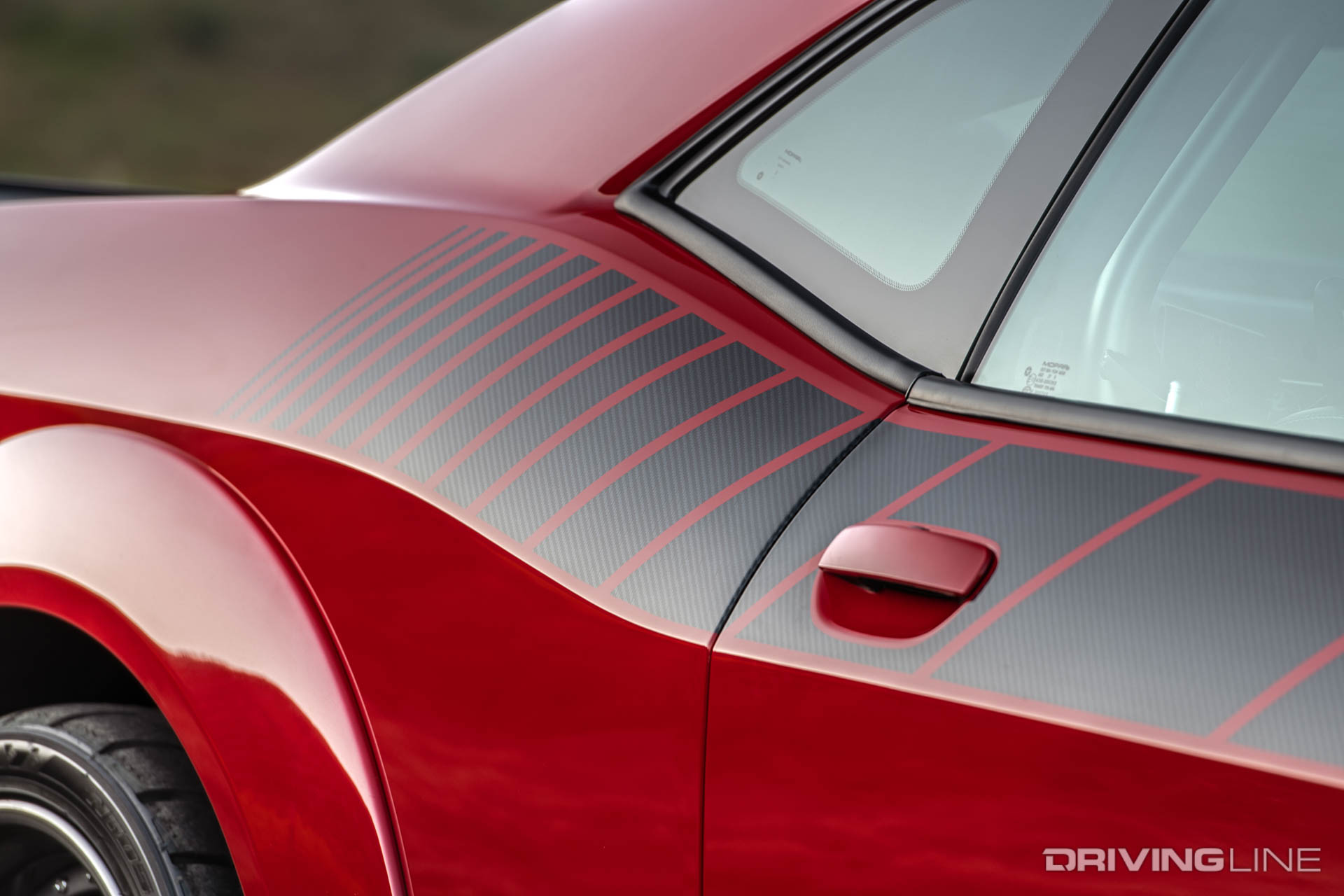 Carbon fiber on rear quarter panel of Dodge Challenger Demon