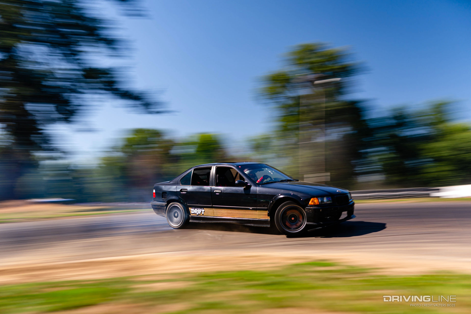 Four-Door BMW E36 drifting