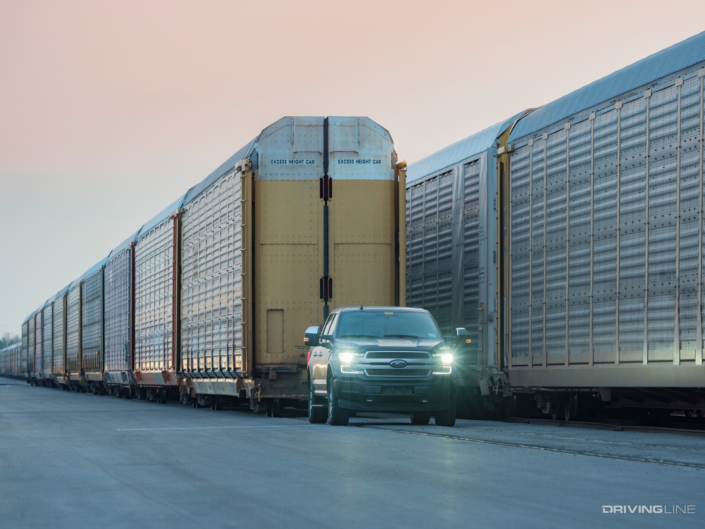 Al-electric Ford F-150 Towing 10 Freight cars