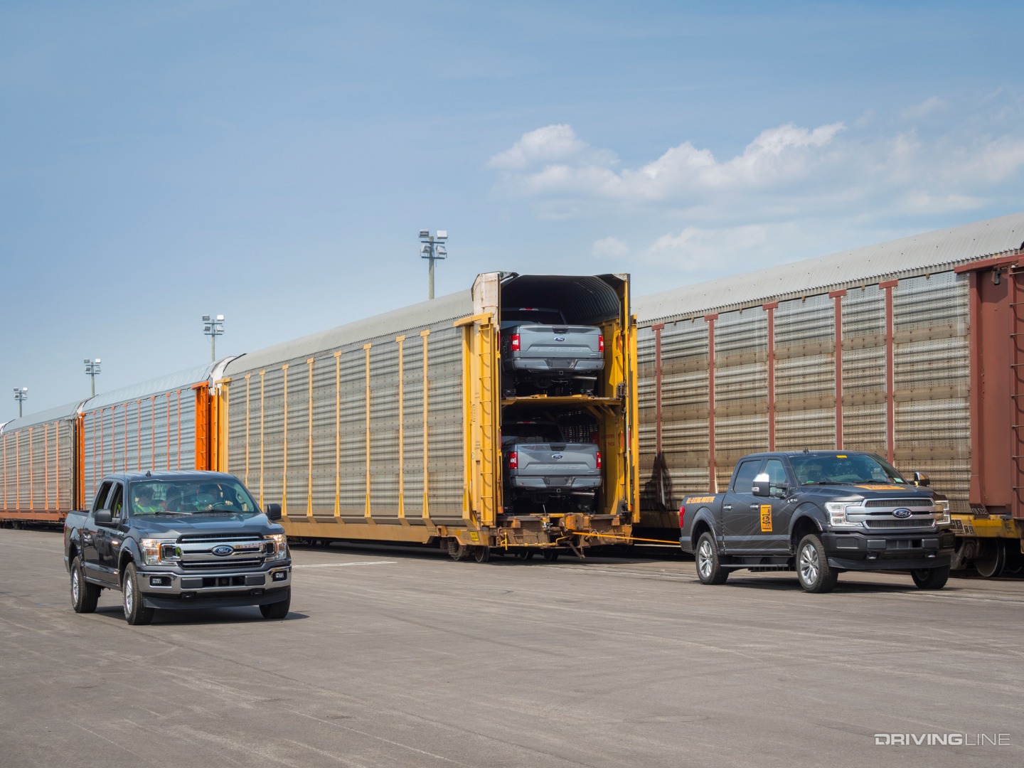 All-Electric Ford F-150 Prototype moving 10 freight cars and 42 Trucks