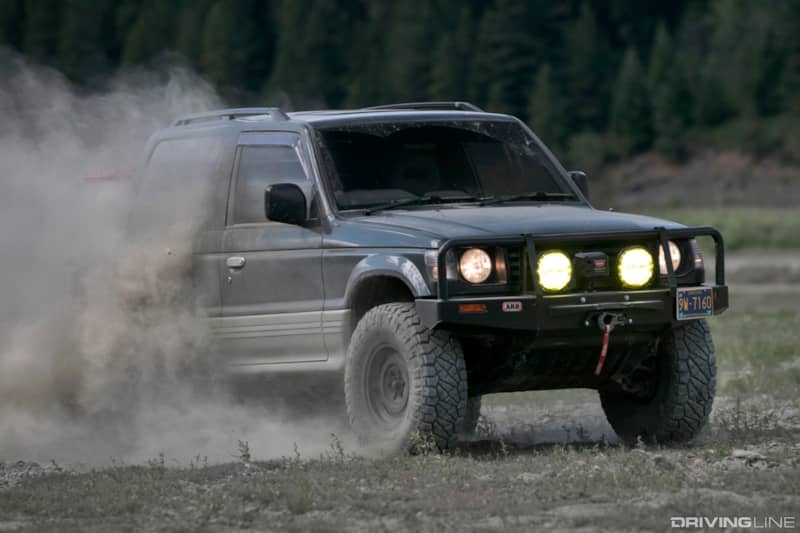 Mitsubishi Pajero rallying through Canadian's Minto silt bed