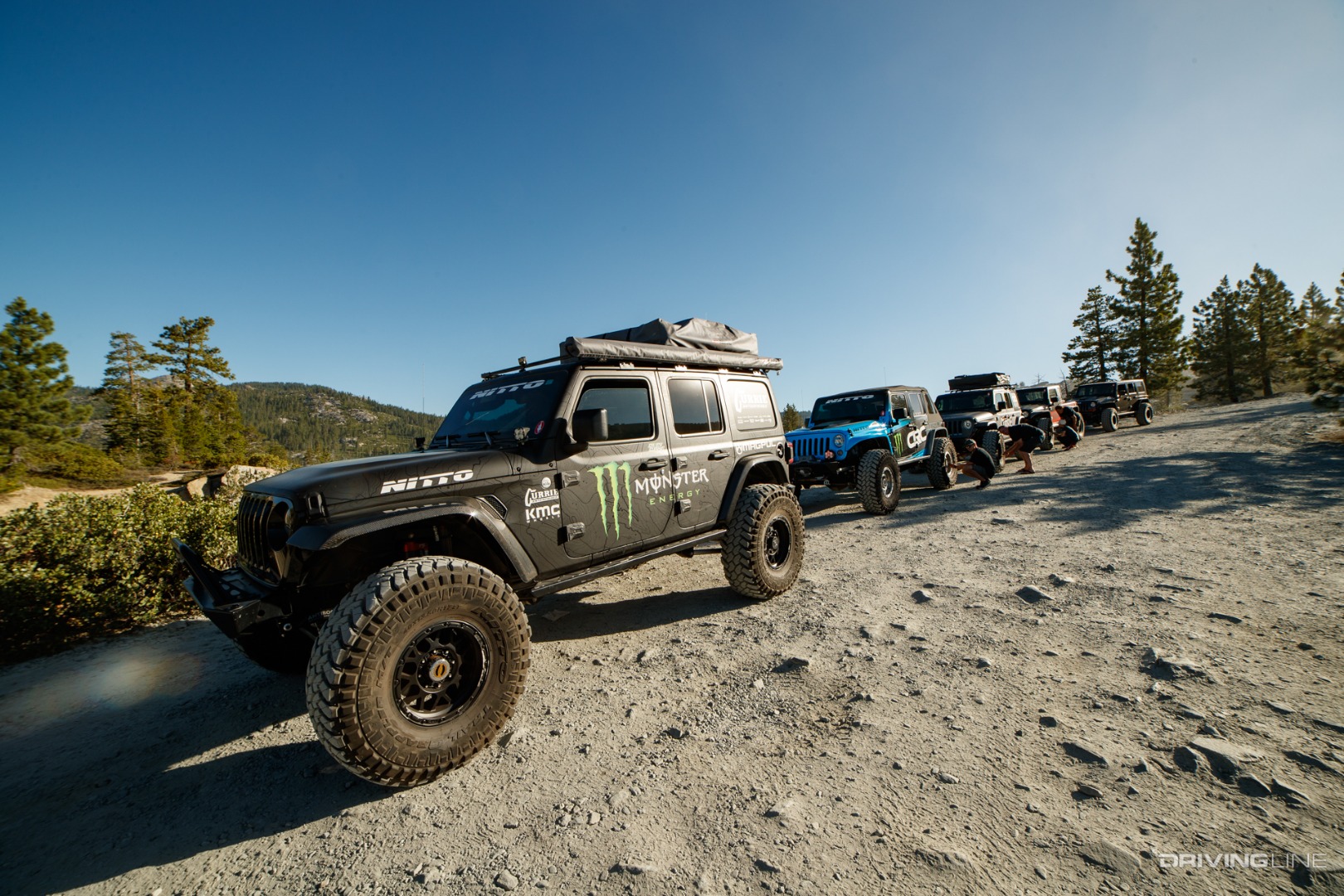 Casey Currie and family in a Jeep