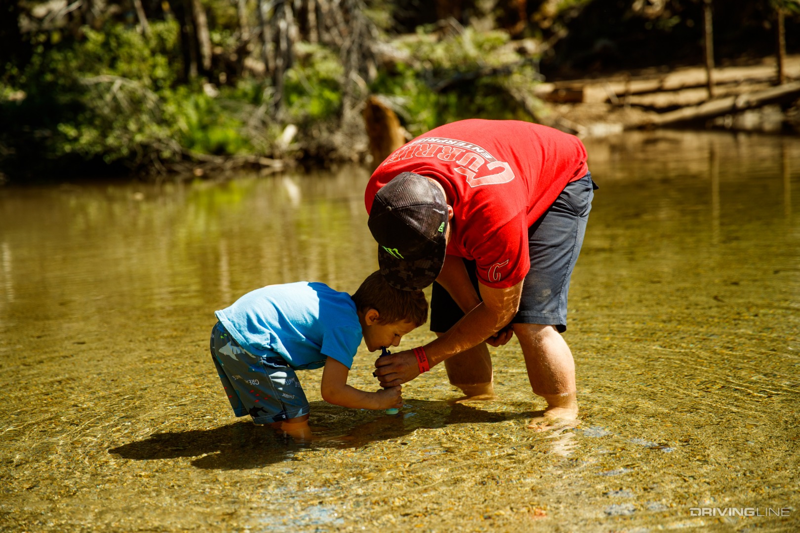 Testing a Life Straw in a river