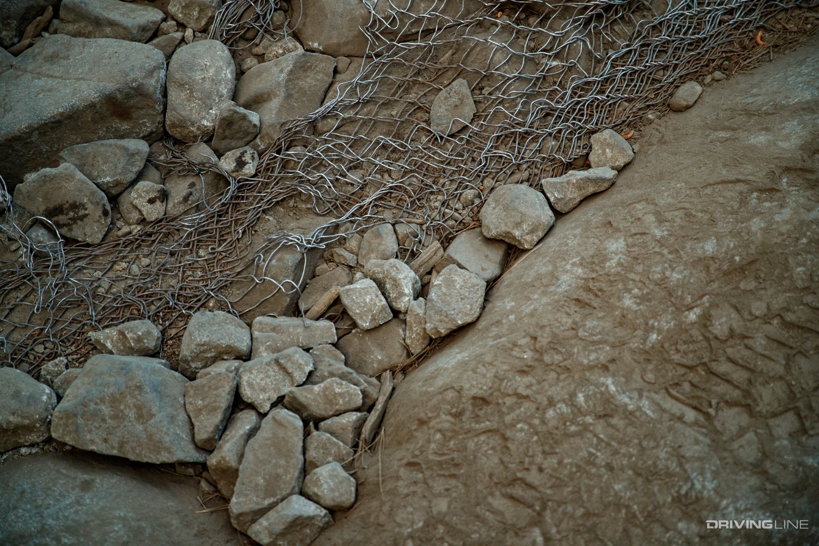 Chain link and cement filler for trail