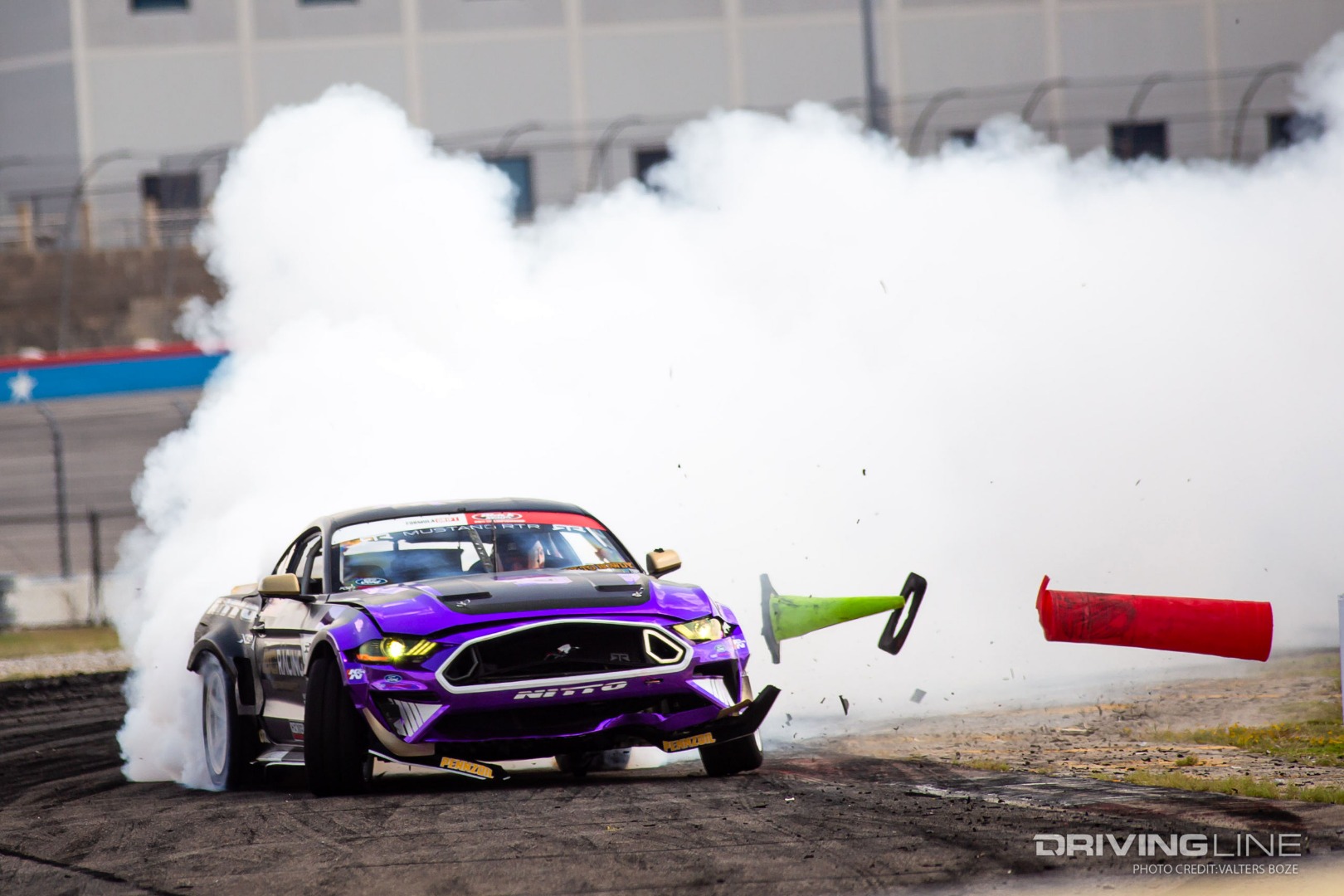 Chelsea Denofa slid his Ford Mustang RTR into the event win at Formula Drift Texas