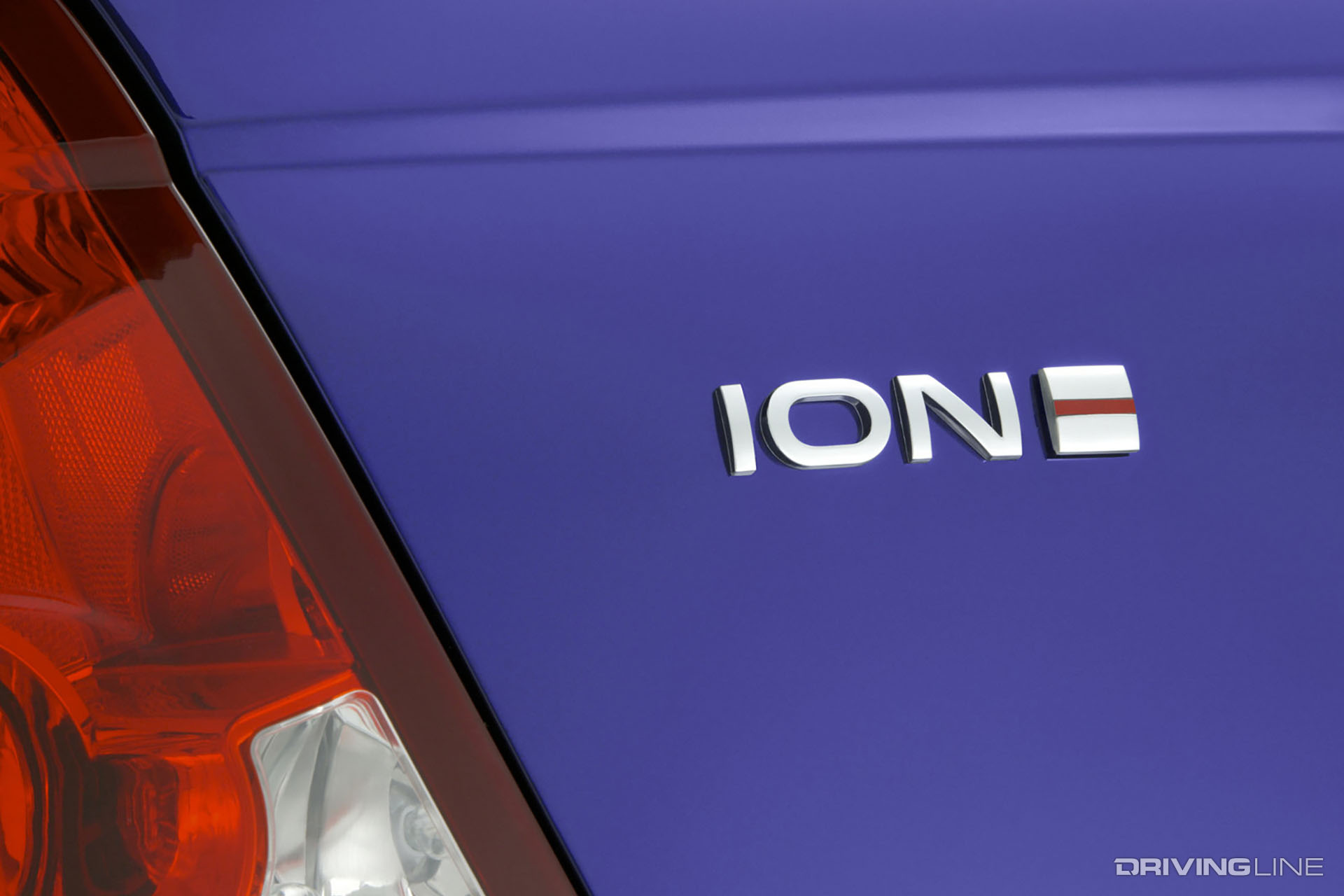 Saturn Ion Red Line Badge