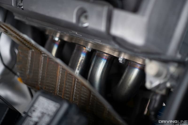 AJ Jaquias Honda S2000 on Nitto NT01 - HyTech header and handmade carbon fiber heat shield