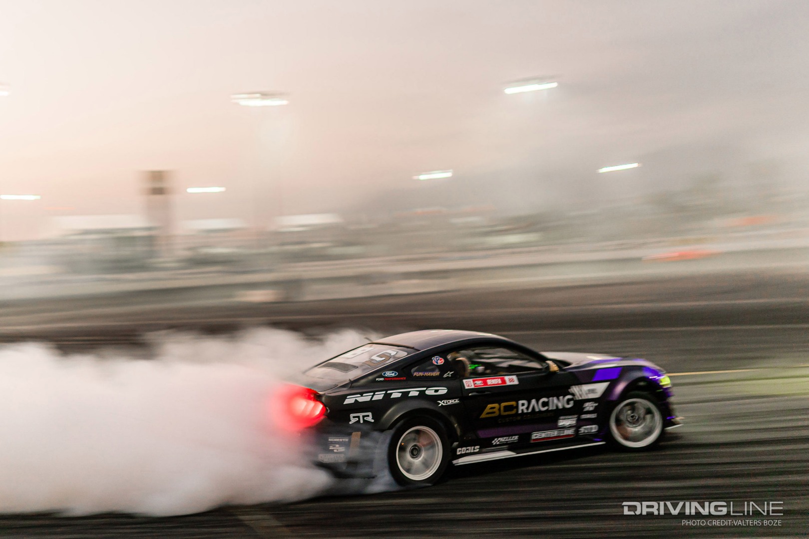 Chelsea Denofa drifts his Ford Mustang RTR into the sunset at Formula Drift Irwindale