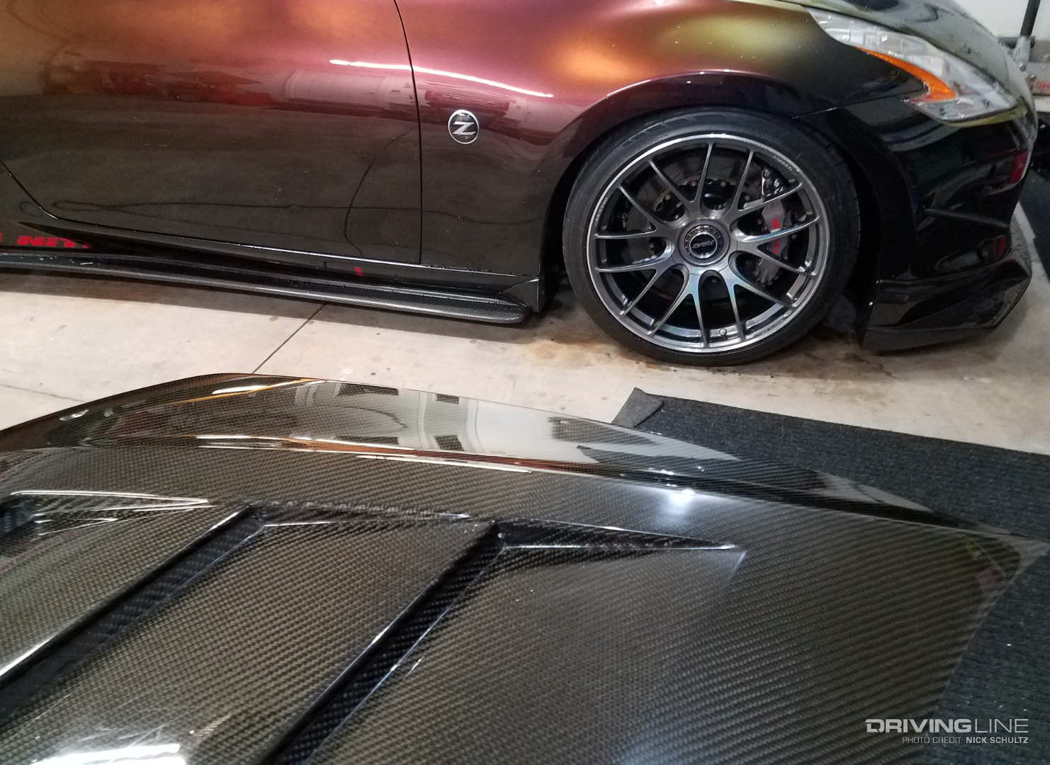 Nissan 370Z with Carbon Fiber on Nitto NT555 G2 tires