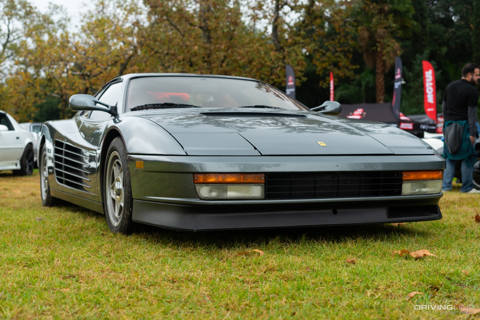 front of Ferrari Testarossa