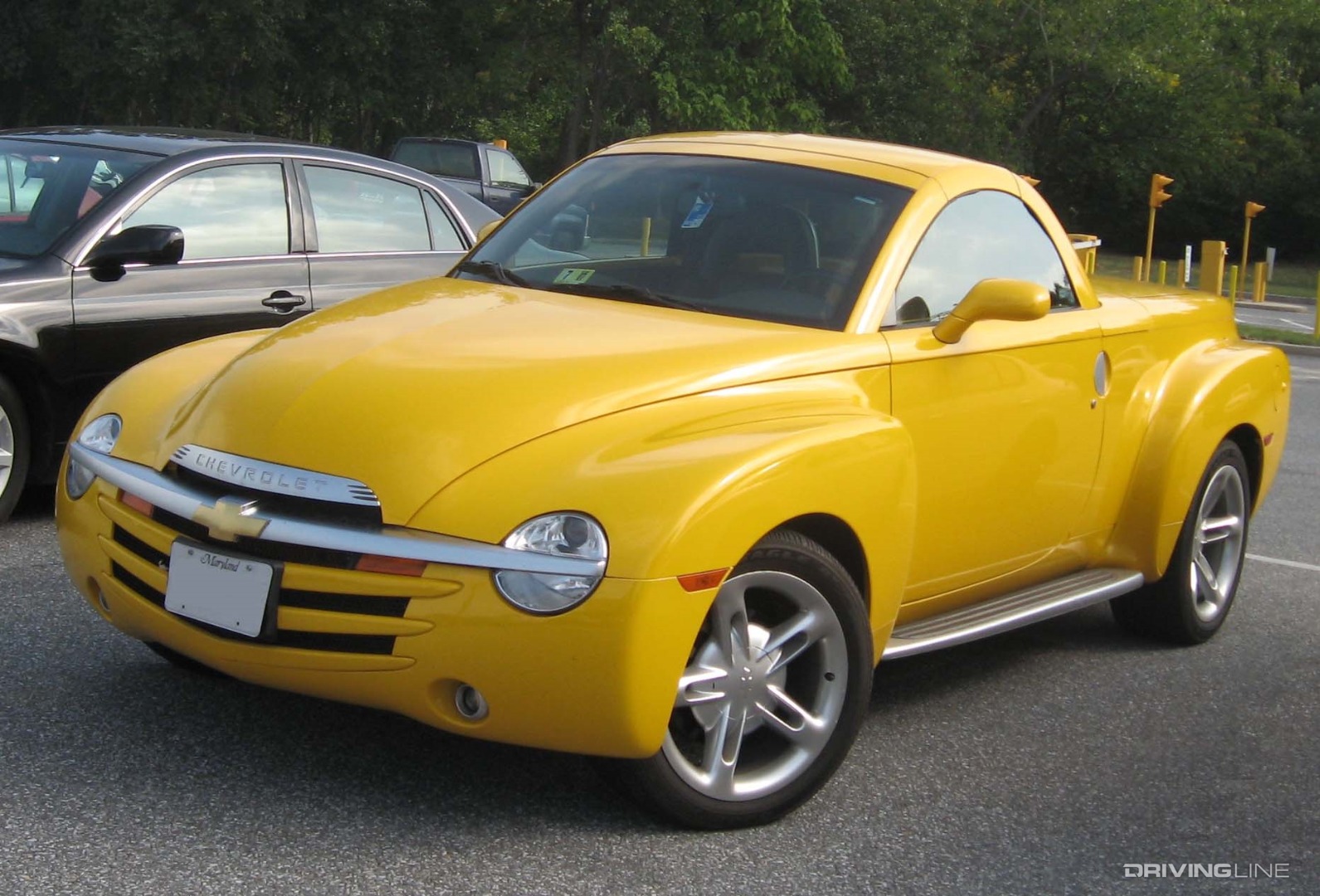 yellow Chevrolet SSR driver side front