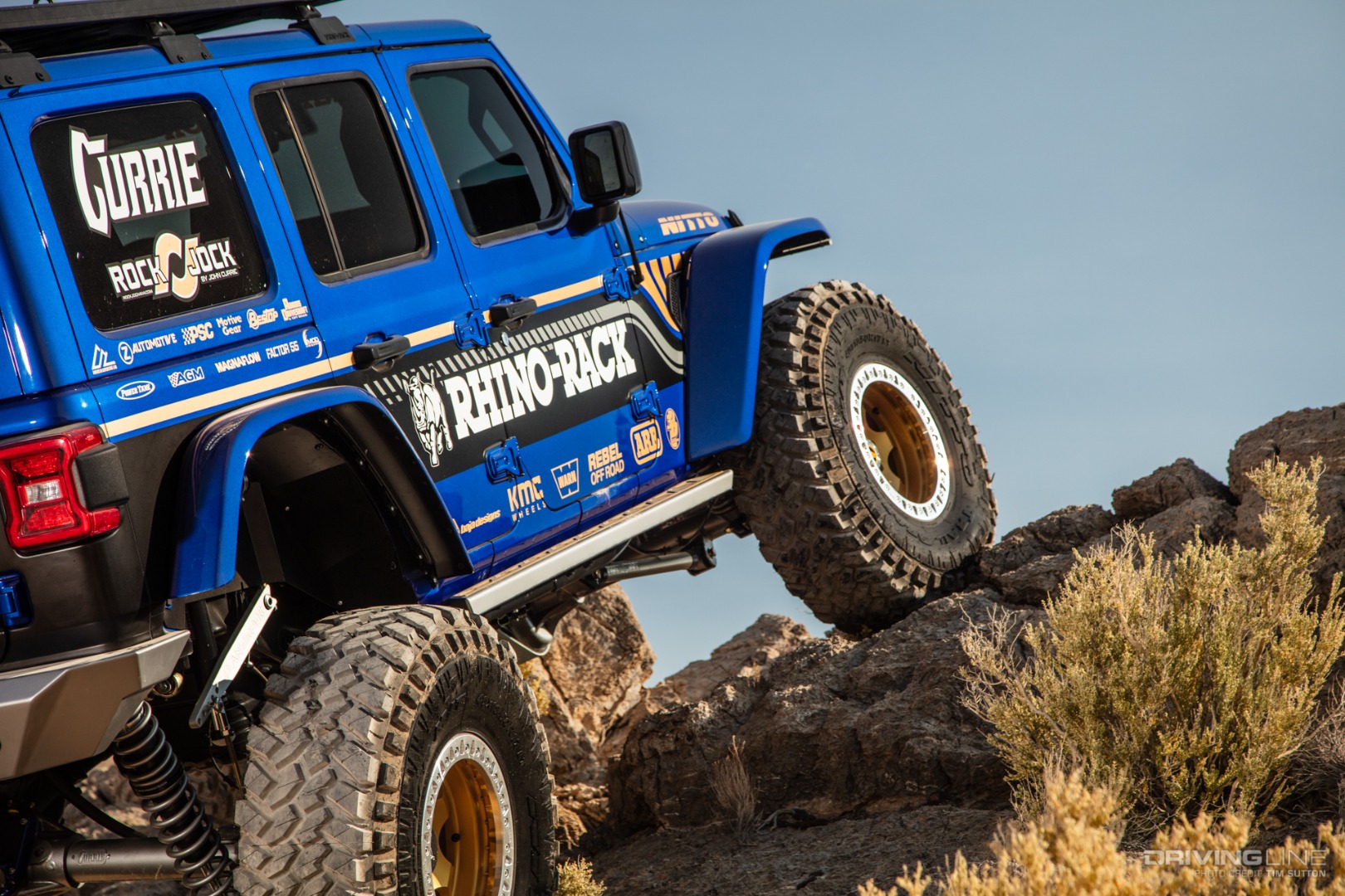 Jeep JL Triton flexing the rear suspension