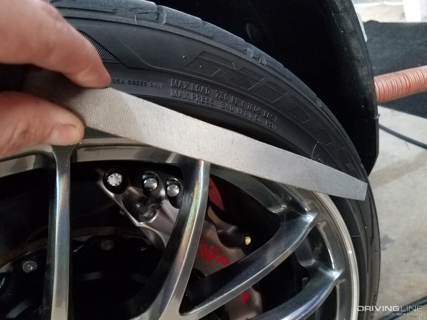 Filing the lip of a wheel to repair it