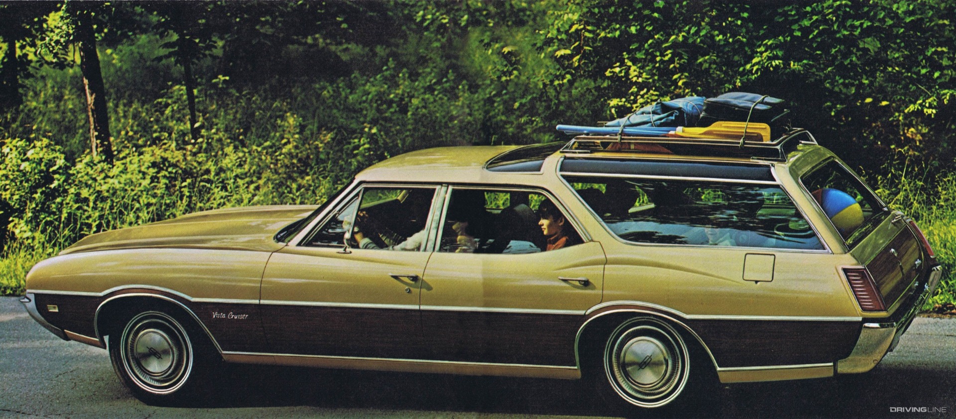 Oldsmobile Vista Cruiser on the road.