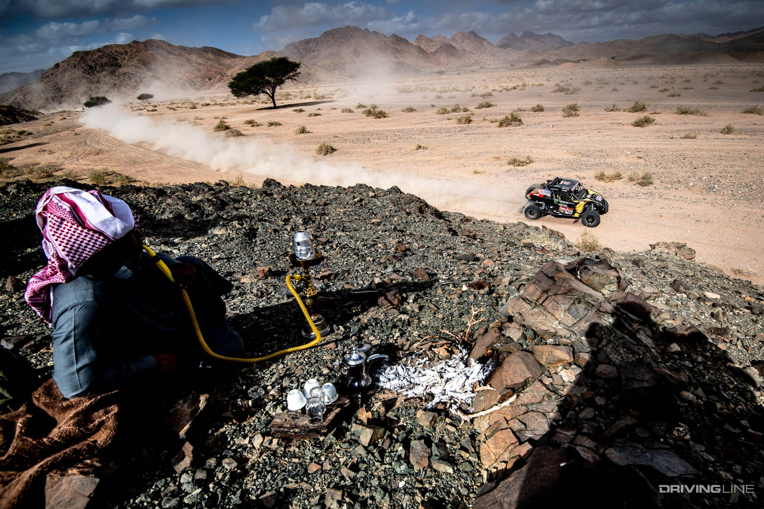 A person watching Casey Currie race in the 2020 Dakar