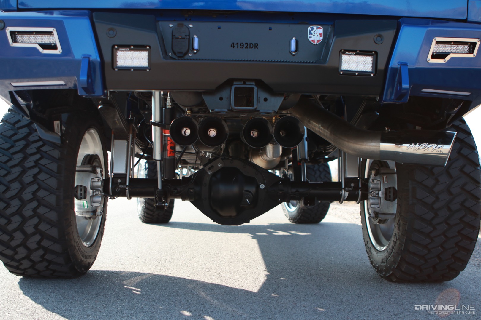 Hornblaster horns mounted beneath lifted Ram 3500