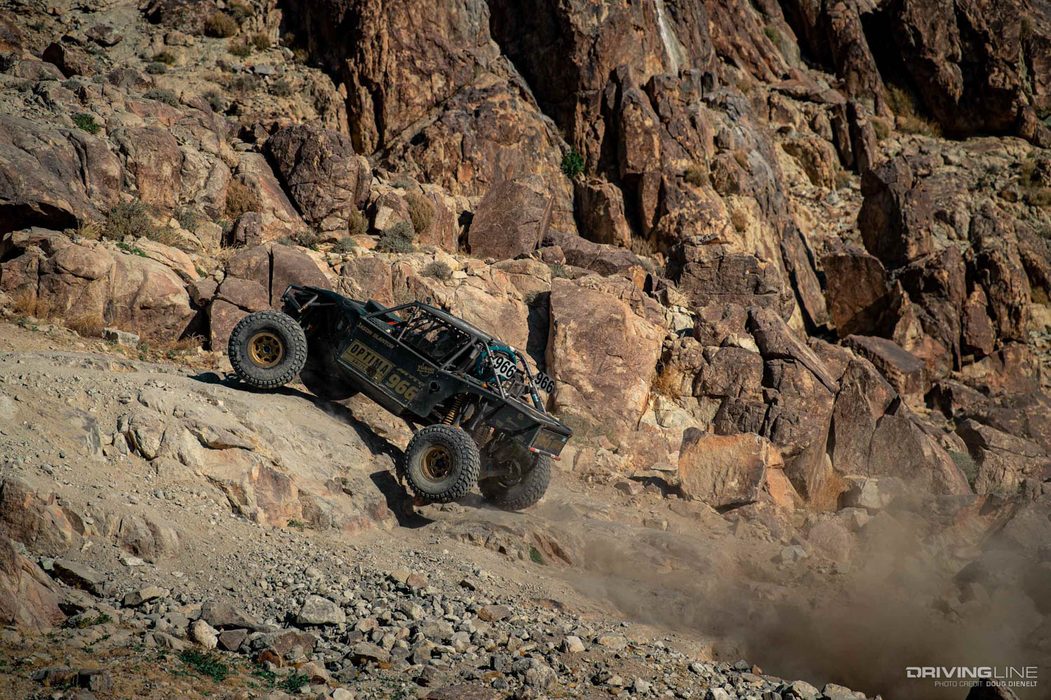 Jason Blanton driving through the rocks