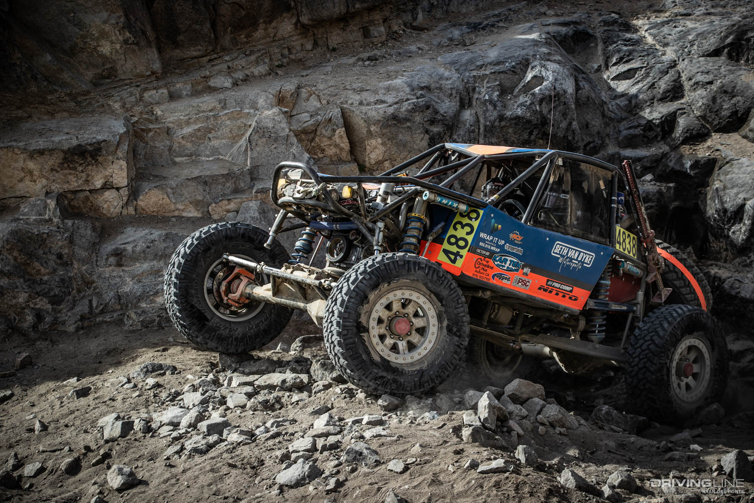 Seth Van Dyke crawling out of rocks at KOH EMC 2020