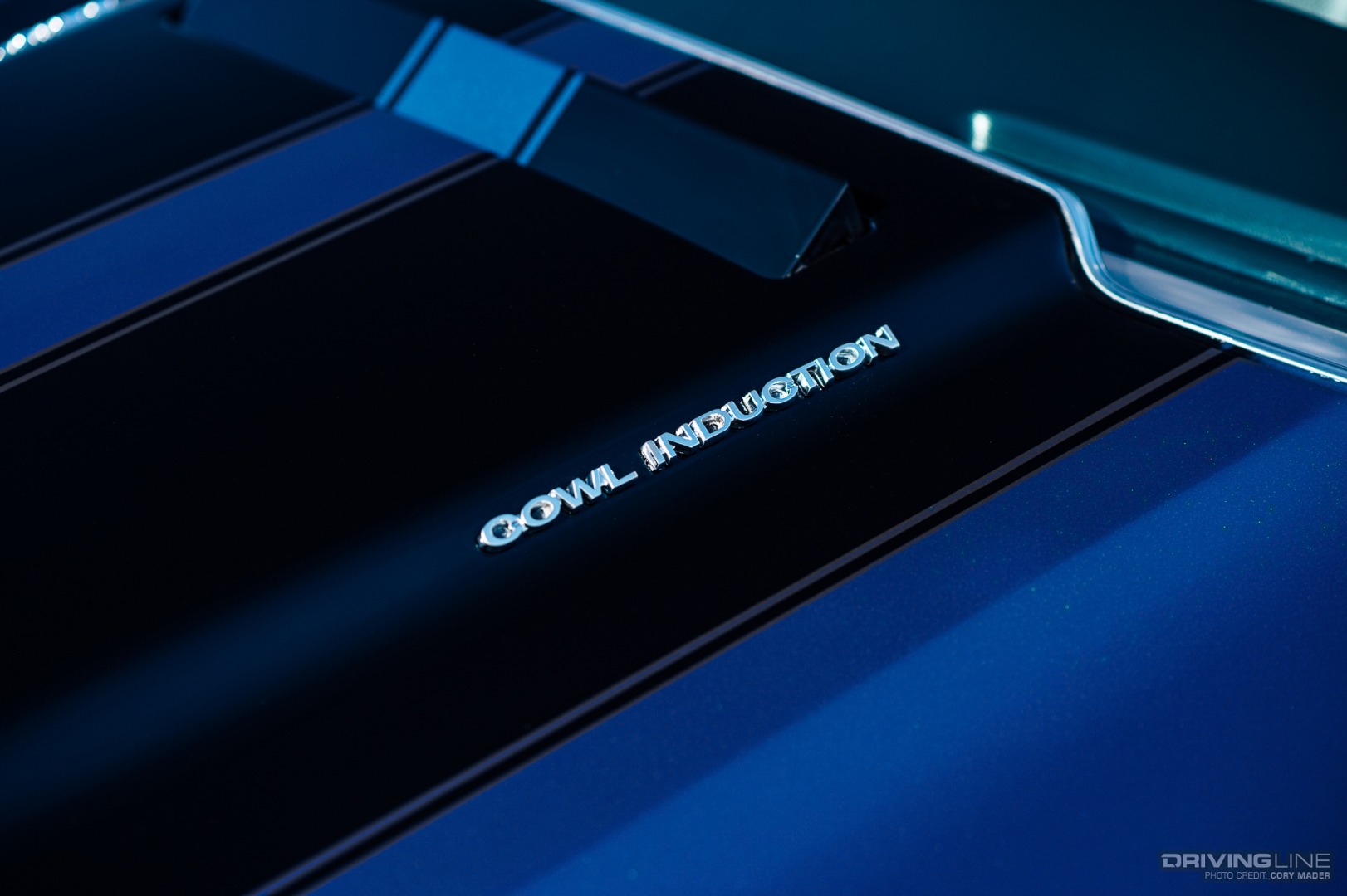 Detail shot of COWL INDUCTION badging on hood of a 1970 Chevy Chevelle SS with Nitto NT555G2 and NT555R tires