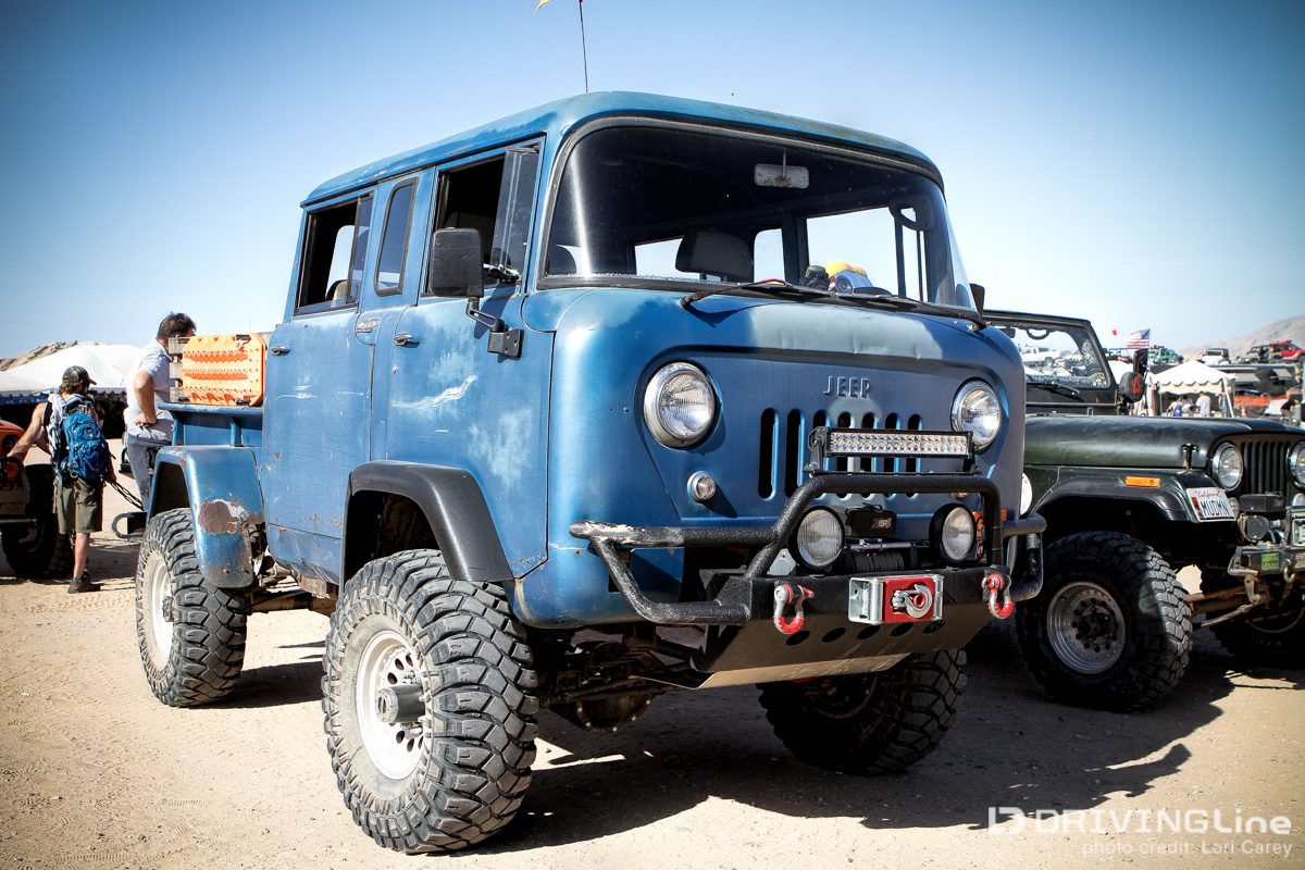 Jeep Forward Control truck blue off-road.