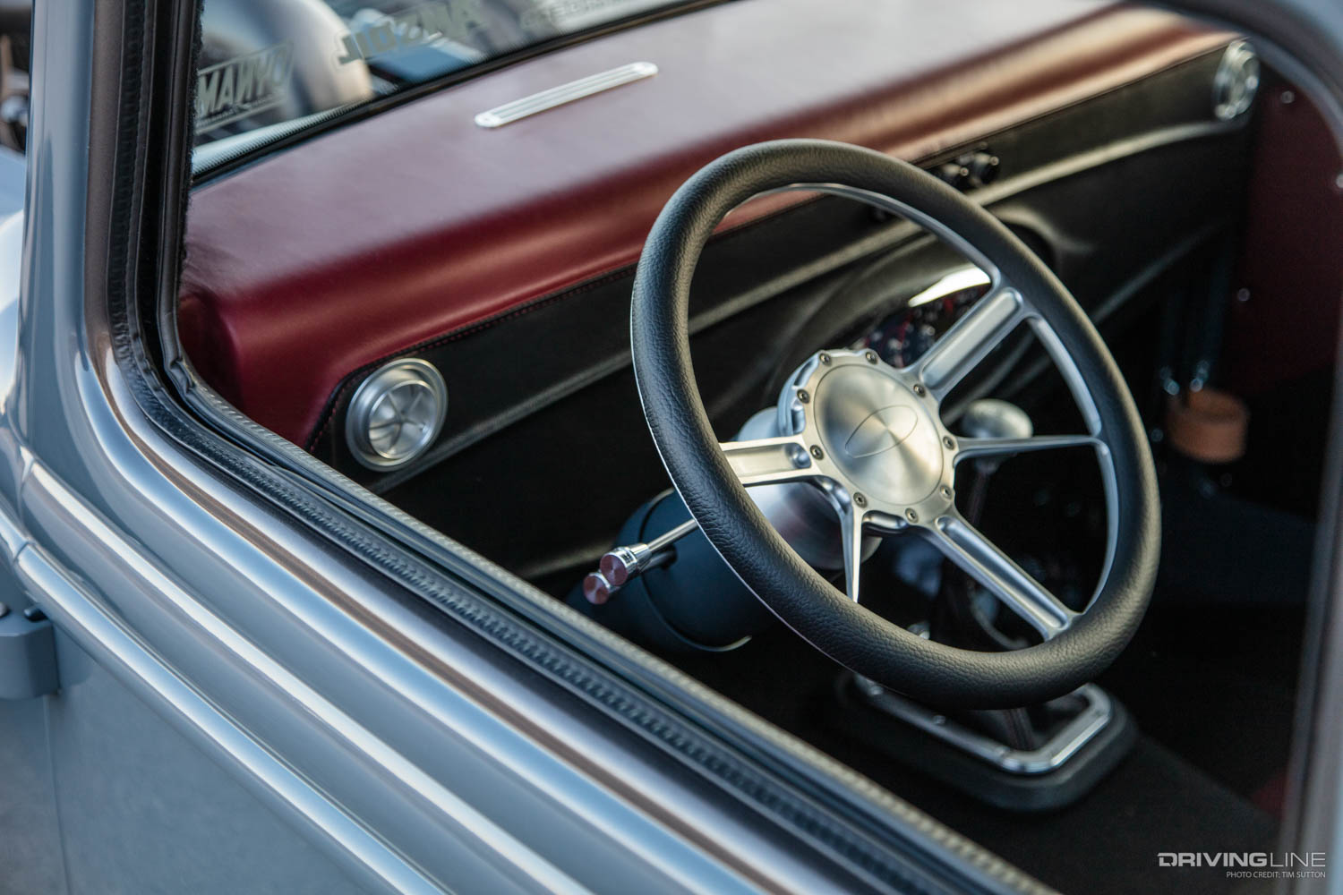 steering wheel of SMG Motoring x Factory Five Racing pickup truck