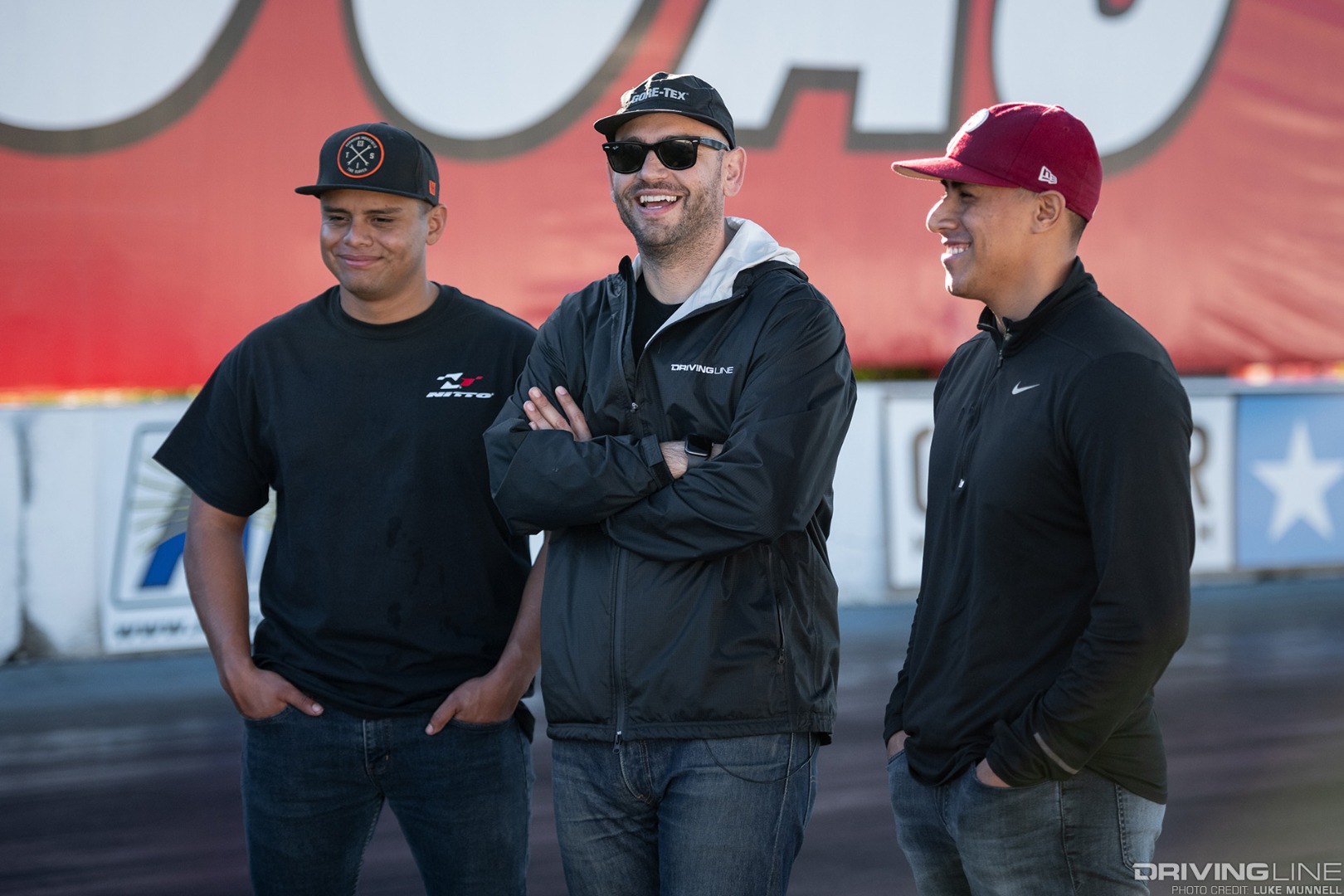 Host of Driving Line Driver Battles Mike Sabounchi with two contestants