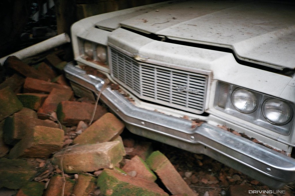 Car with pile of bricks