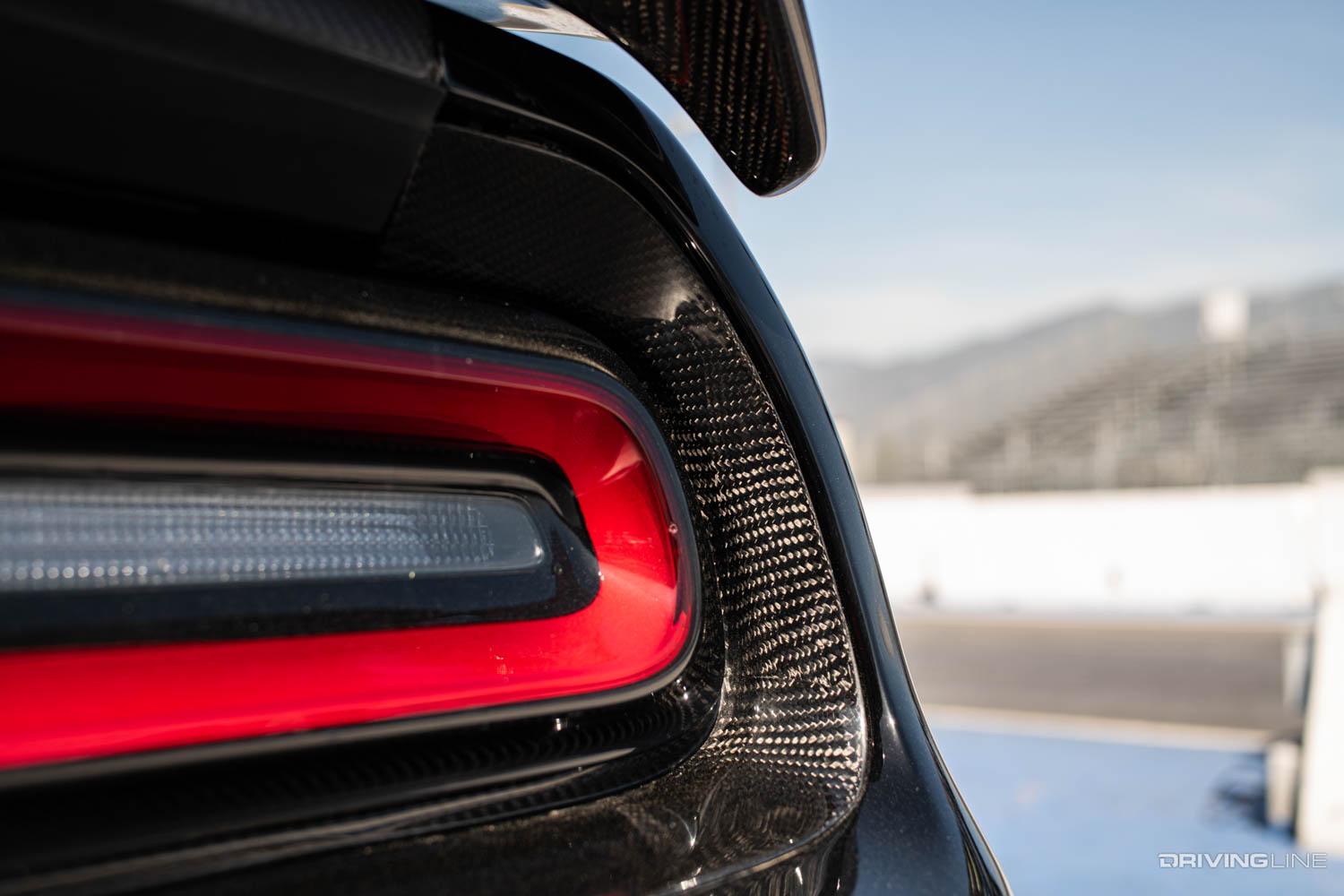 2018 Dodge Challenger Hellcat taillight with anderson composites carbon fiber parts