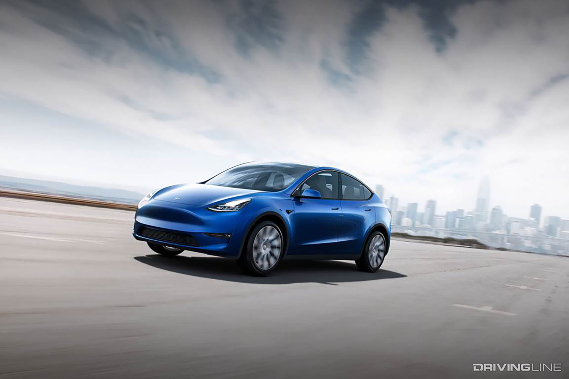 Tesla Model Y Blue In Motion