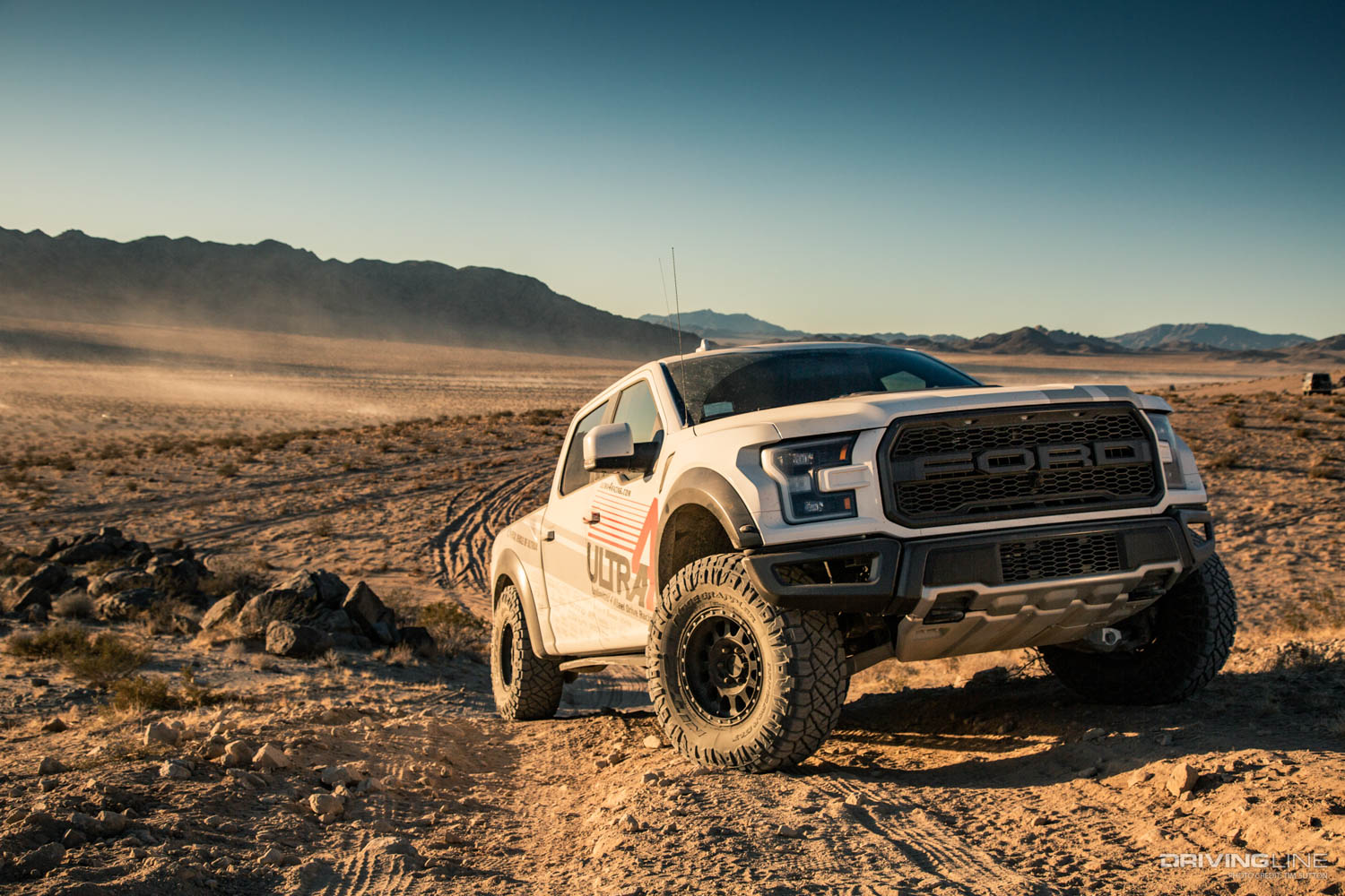 Ford F-150 driving up a desert off-road track