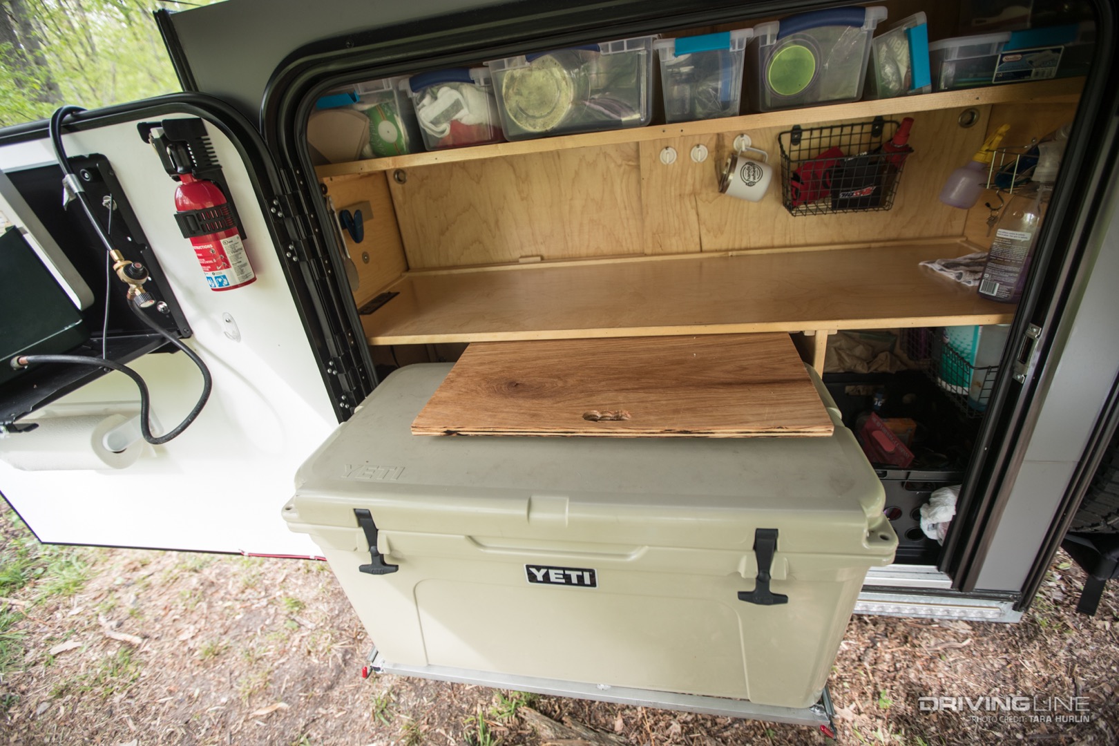 Overland Escapade Camper storage with pull out Yeti cooler
