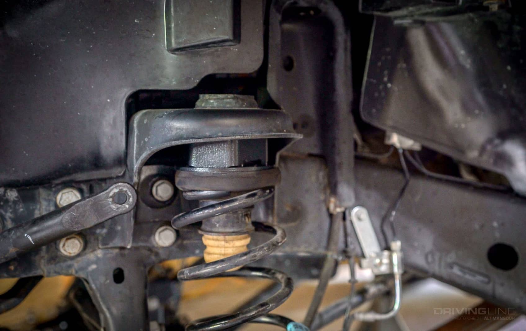 Inside Line The Truth About Coil Spacer Lifts (The Cheapest Way to Lift A Wrangler) DrivingLine