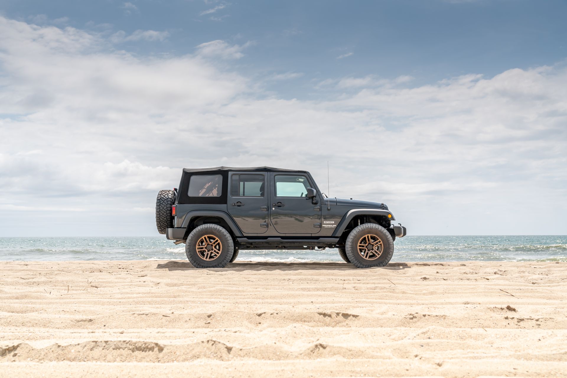 Jeep Wrangler JK coil spacer lift 35 Nitto Ridge Grapplers budget boost