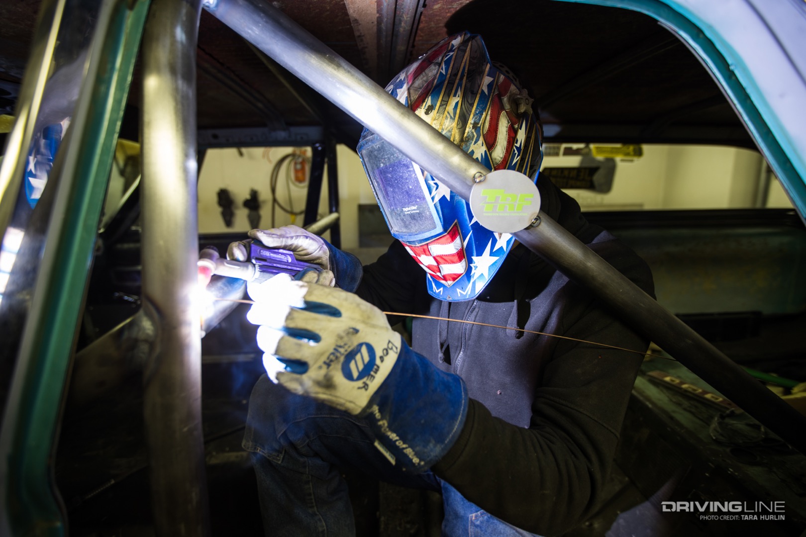 Ryan Thompson of TRF TIG welding a NHRA roll cage.