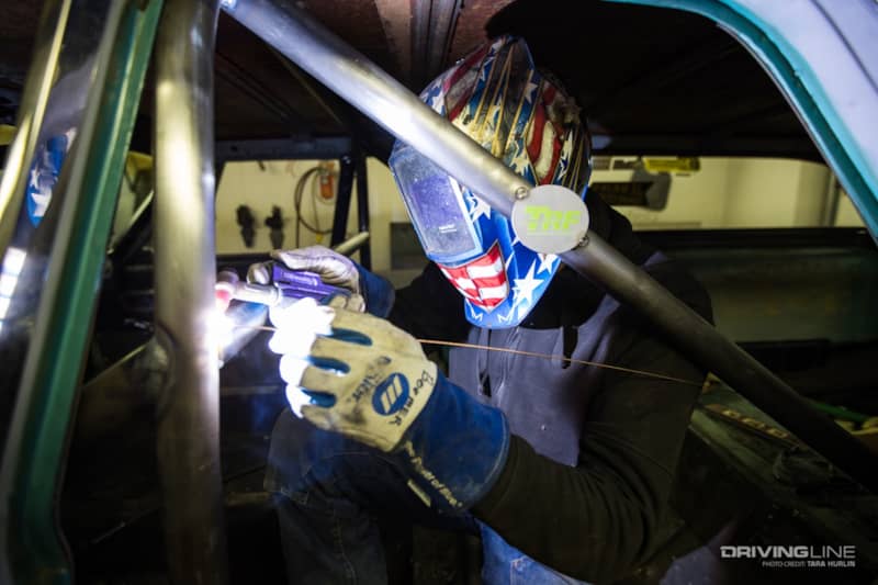 Ryan Thompson of TRF TIG welding a NHRA roll cage.