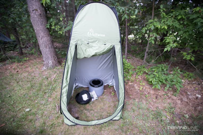 Pop up tent and portable toilet for pooping in privacy while camping