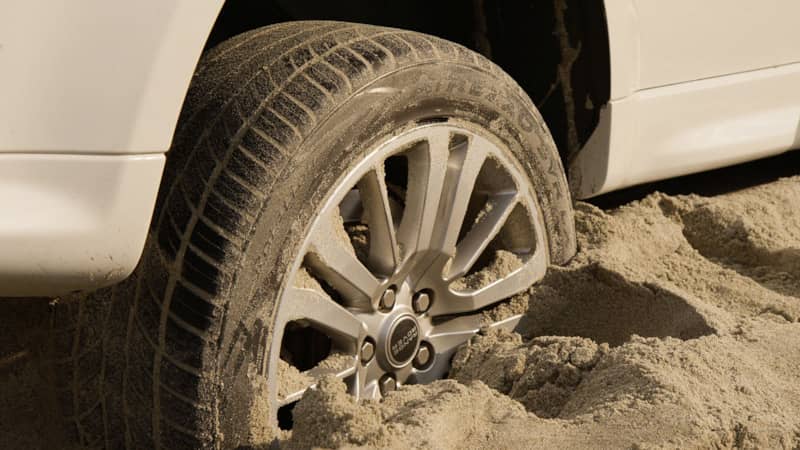 Stuck land rover on beach