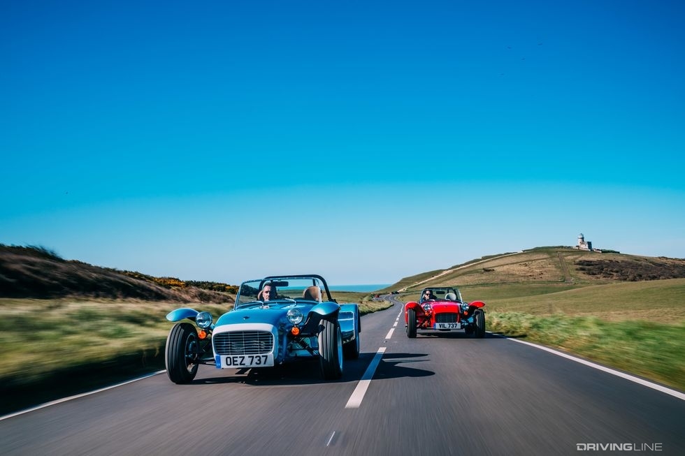 Caterham Seven red and blue on open road