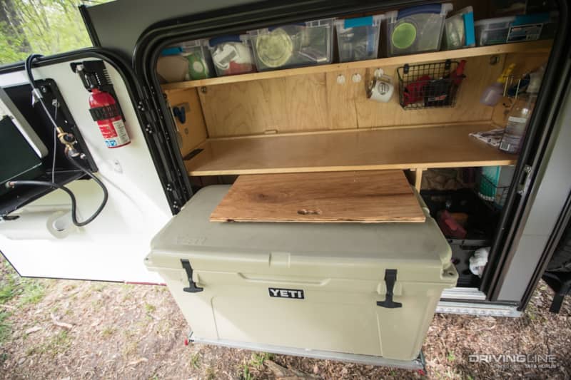 Yeti cooler storage in off-road camper trailer