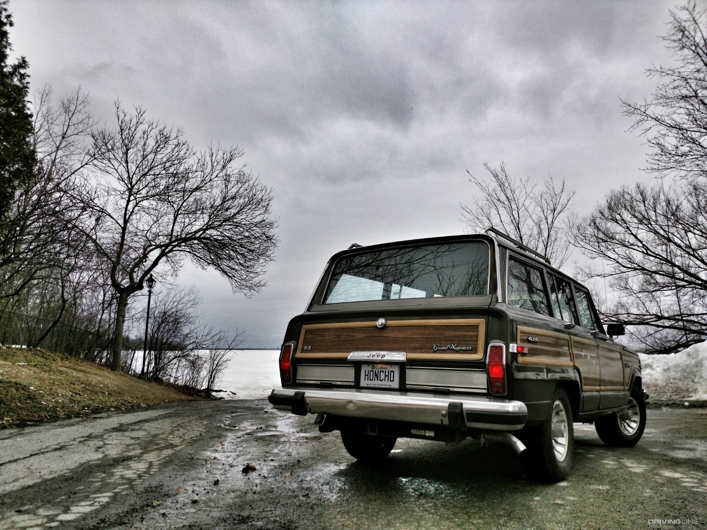 1987 Jeep Grand Wagoneer near lake