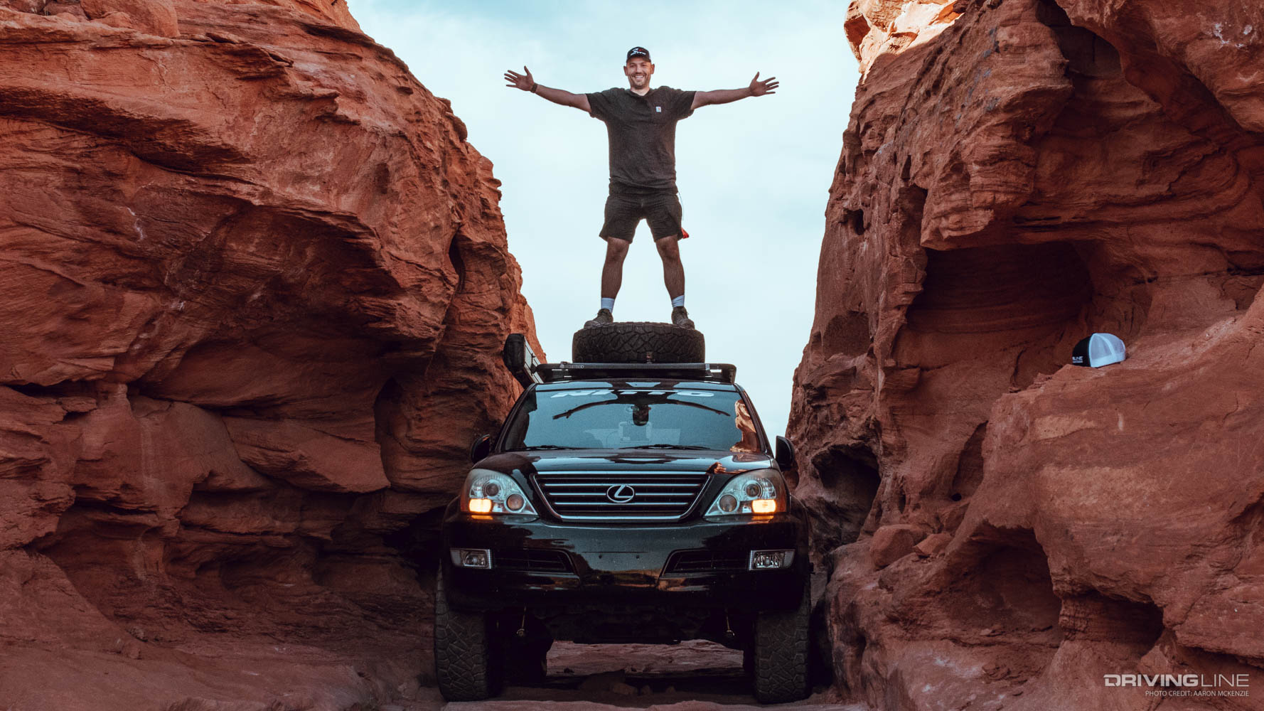 Mike Sabounchi standing atop his GX470