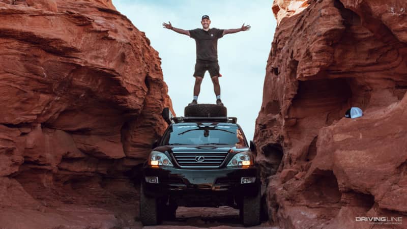 Mike Sabounchi standing atop his GX470
